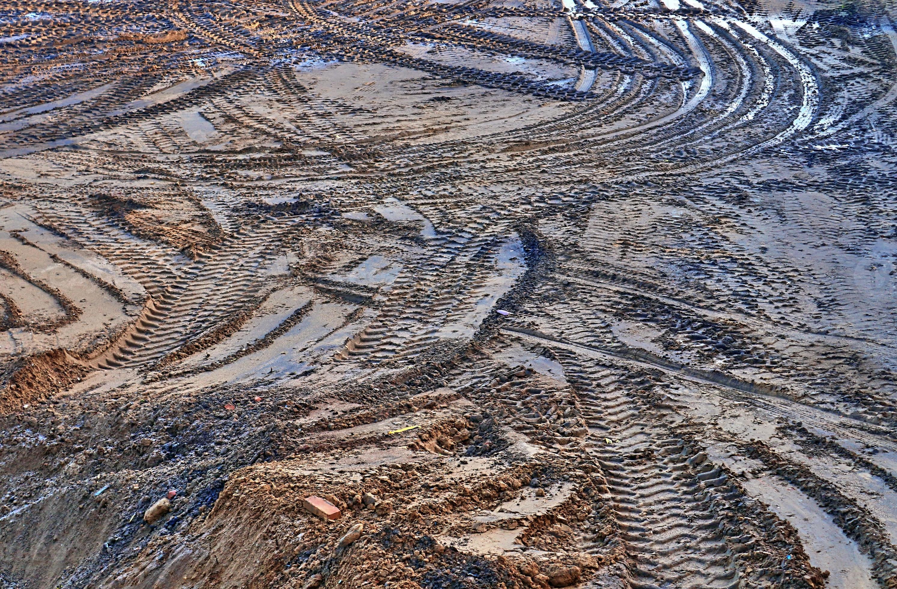 View into a gravel pit with piles of sand and some tire tracks 9404321 Stock Photo at Vecteezy
