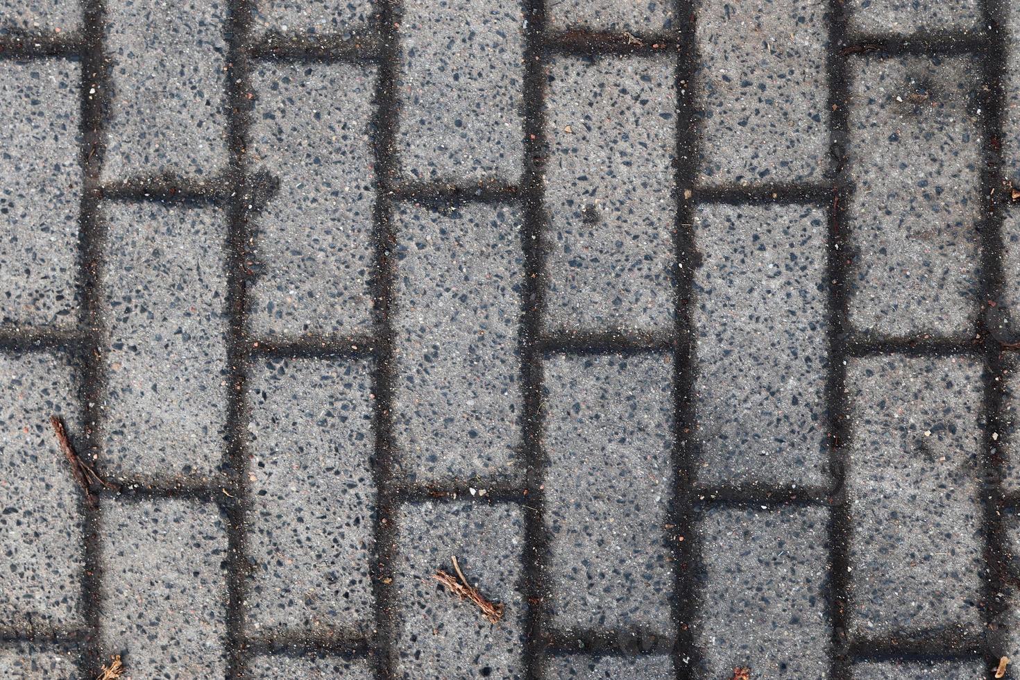Detailed close up on old historical cobblestone roads and walkways photo