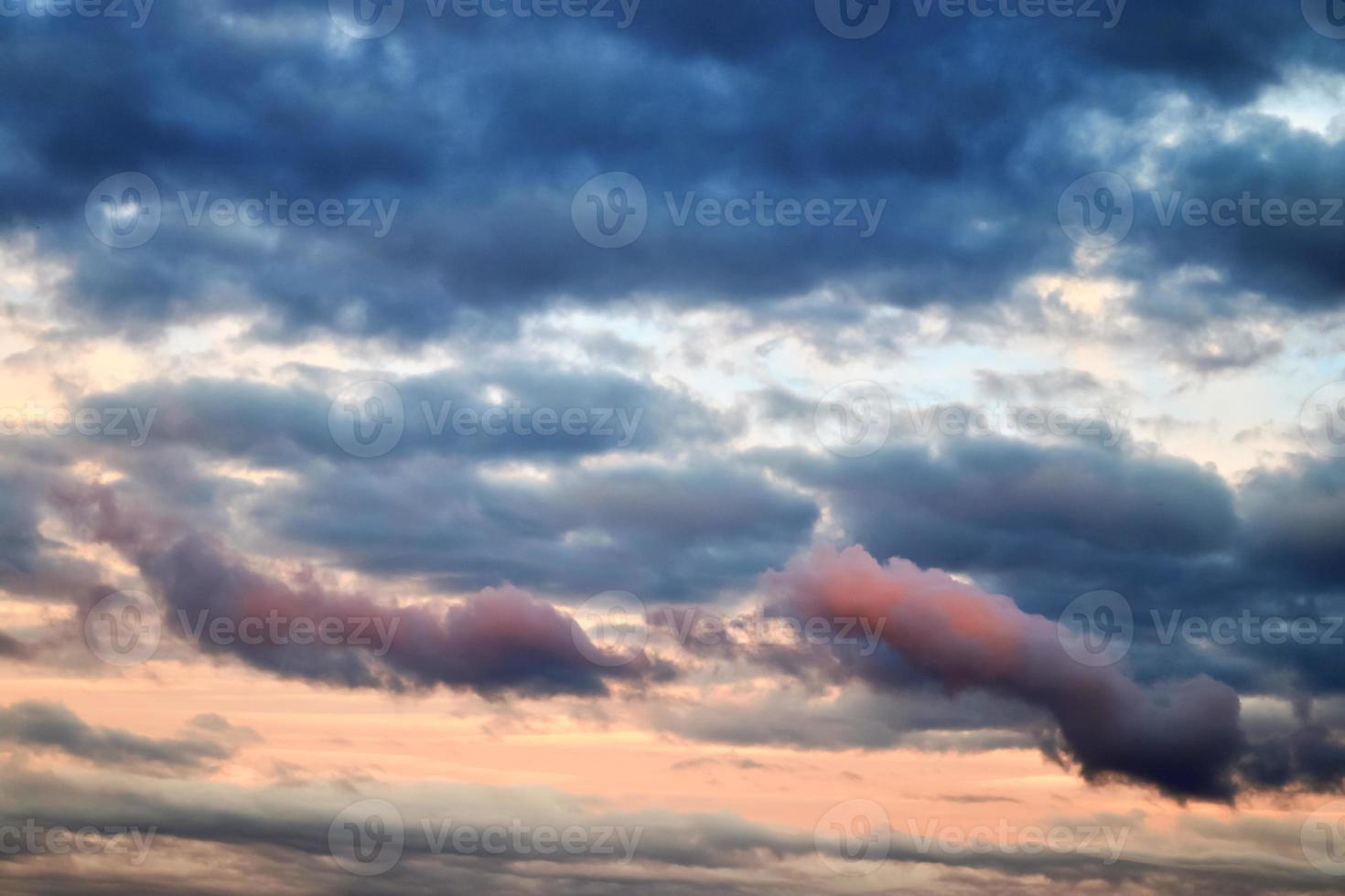 Beautiful panorama of orange and yellow clouds at sunrise photo