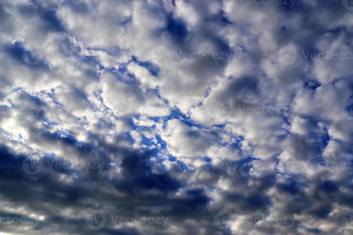 Beautiful panorama of orange and yellow clouds at sunrise photo