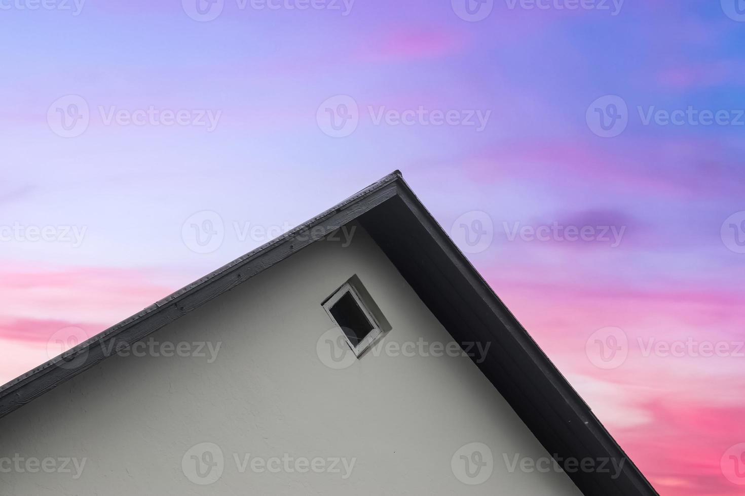 Roof window in velux style with roof tiles - icelandic architecture. photo