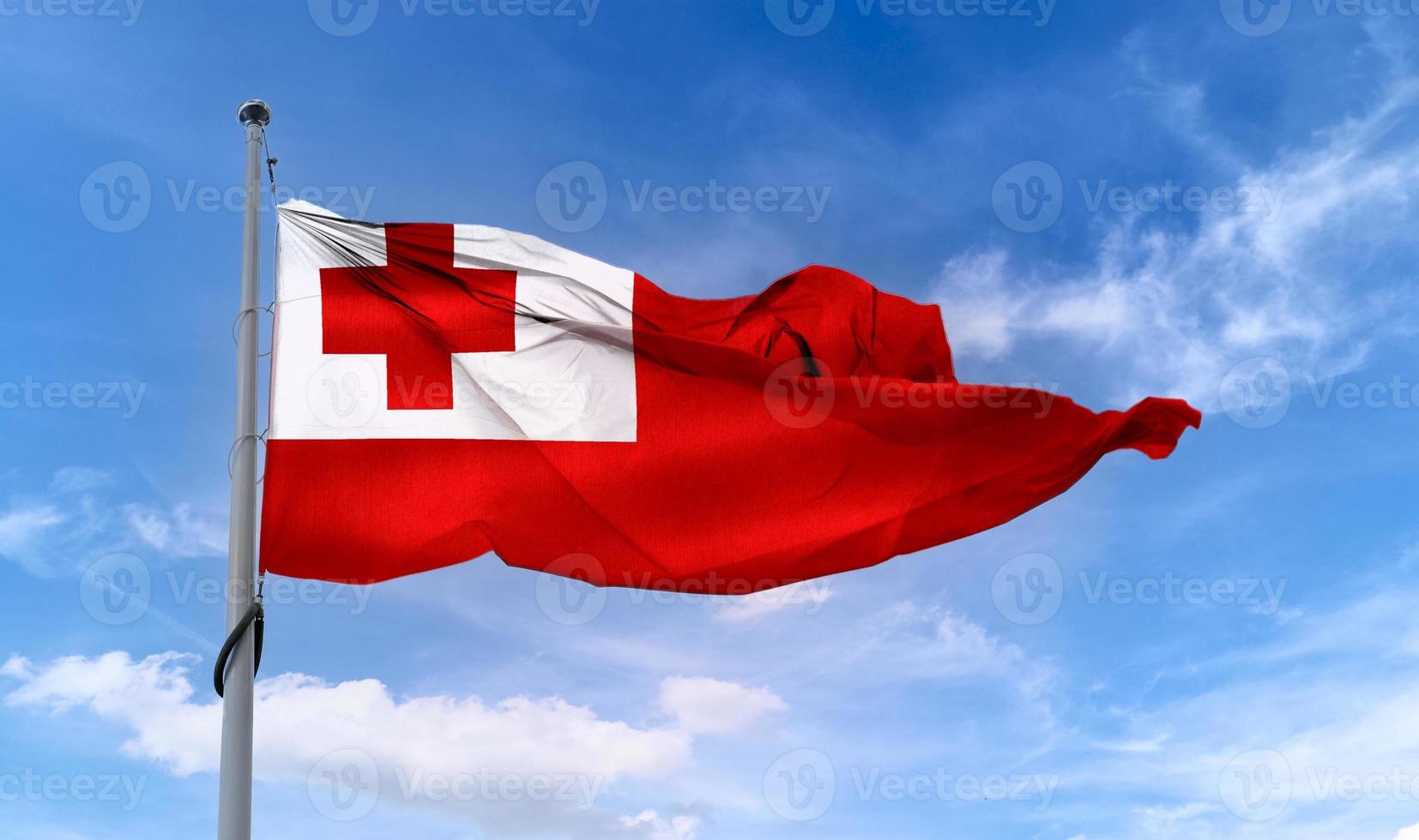 3D-Illustration of a Tonga flag - realistic waving fabric flag. photo