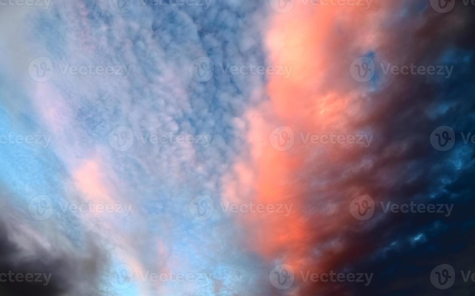 Beautiful panorama of orange and yellow clouds at sunrise photo