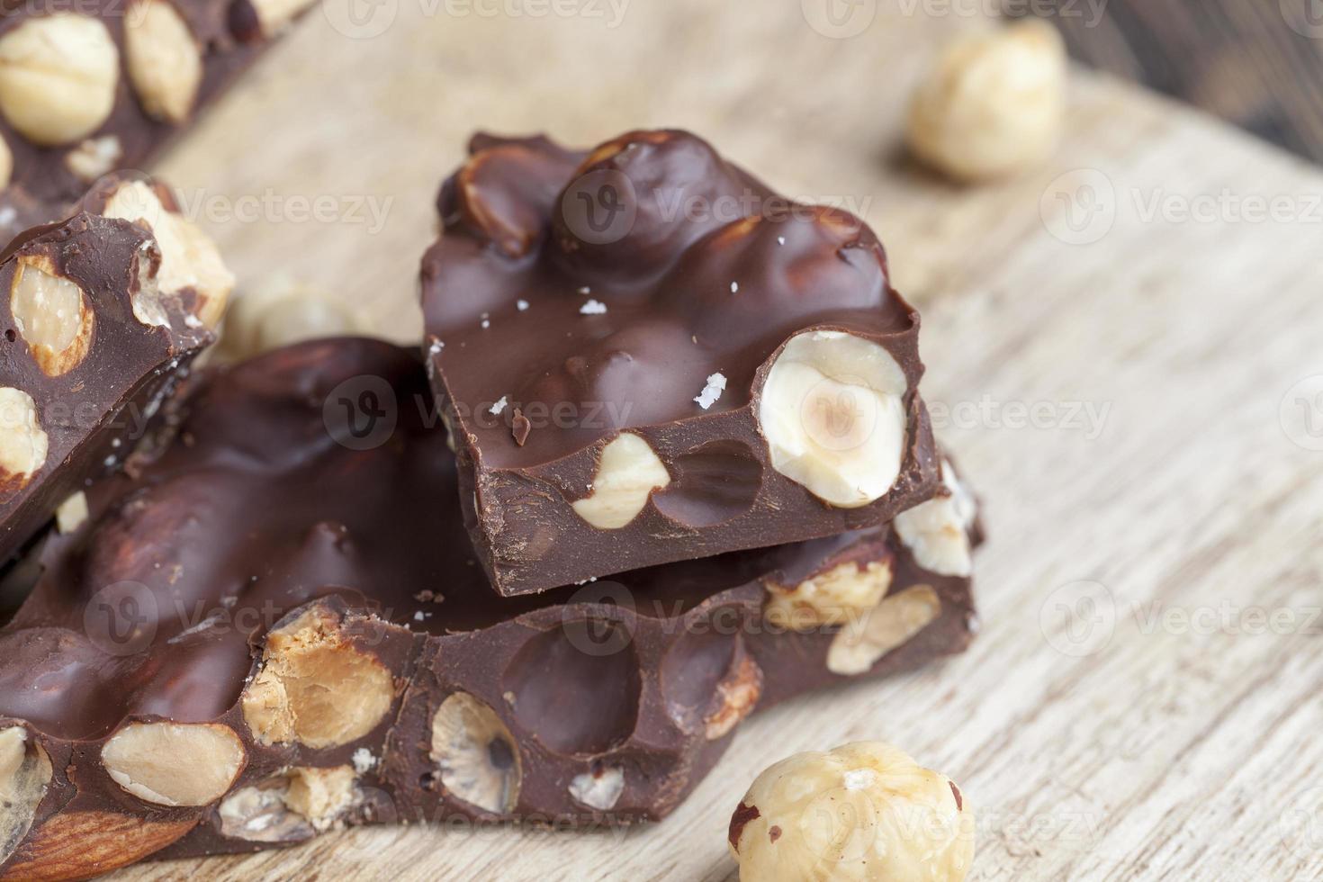 homemade chocolate with a large number of nuts photo