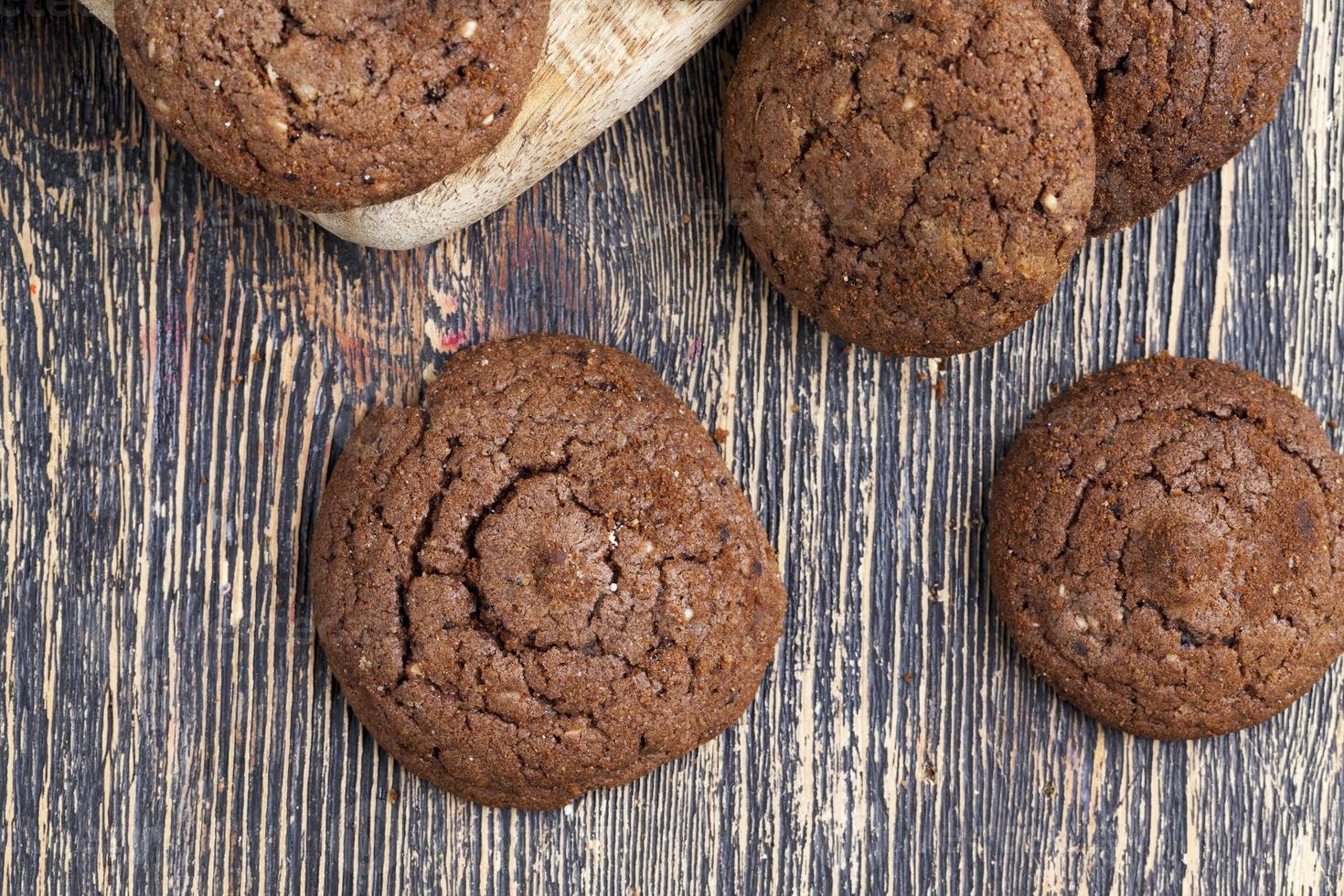 chocolate cookies on a wooden table photo