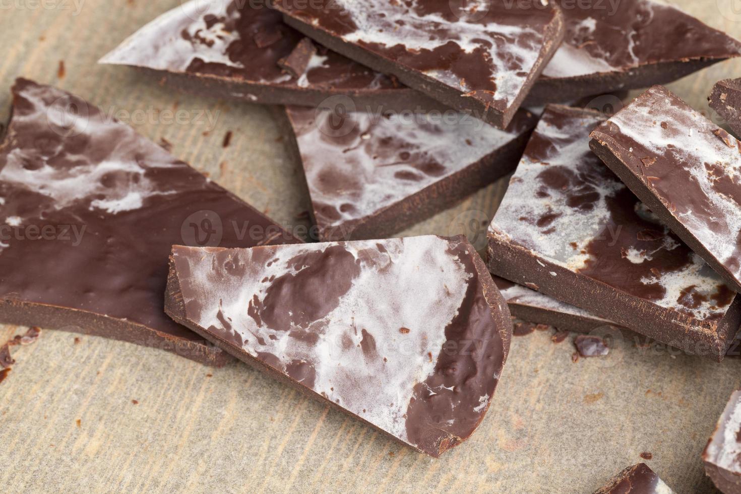 chocolate is broken into a large number of pieces photo