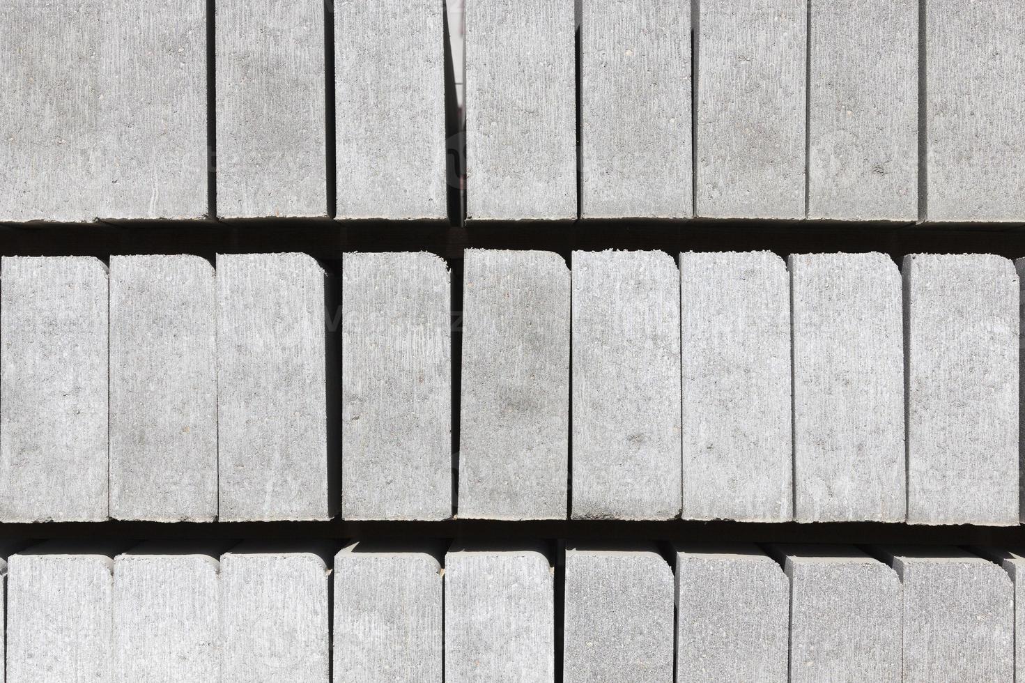 grey curbs and new construction tiles photo