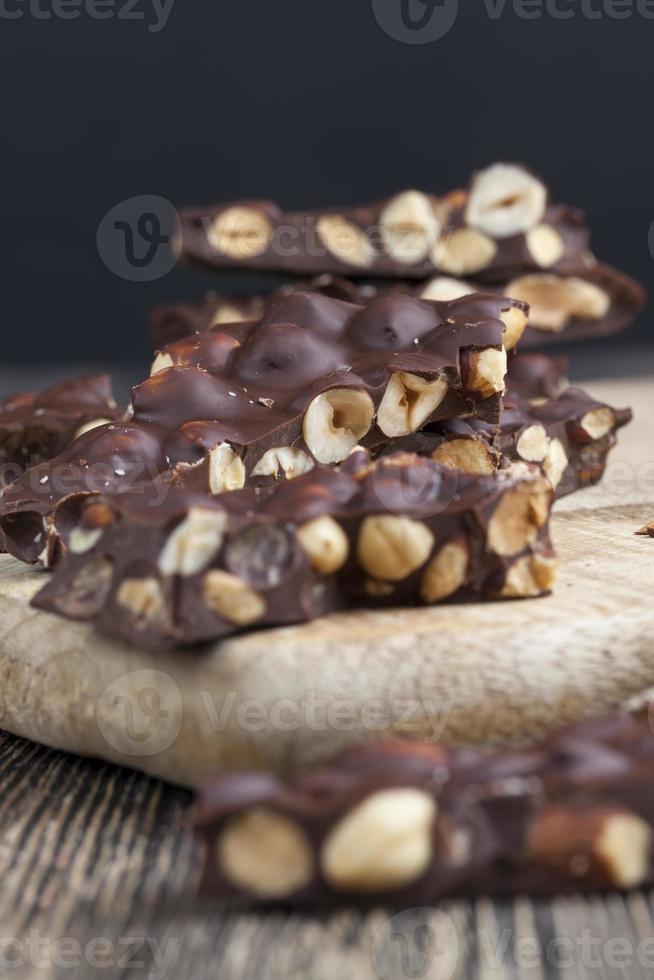 homemade chocolate with a large number of nuts photo