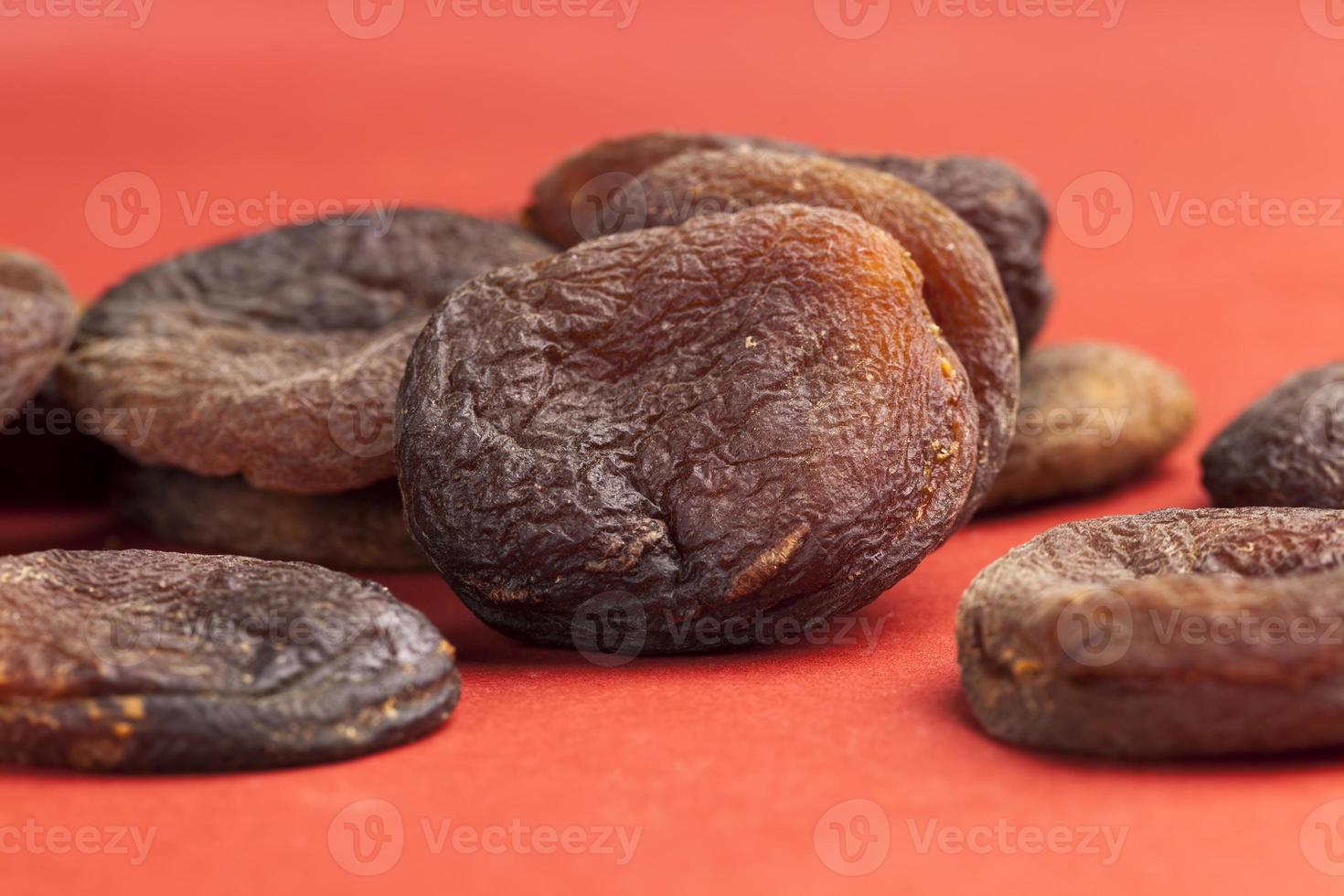 dark dried apricots of large size 9407534 Stock Photo at Vecteezy