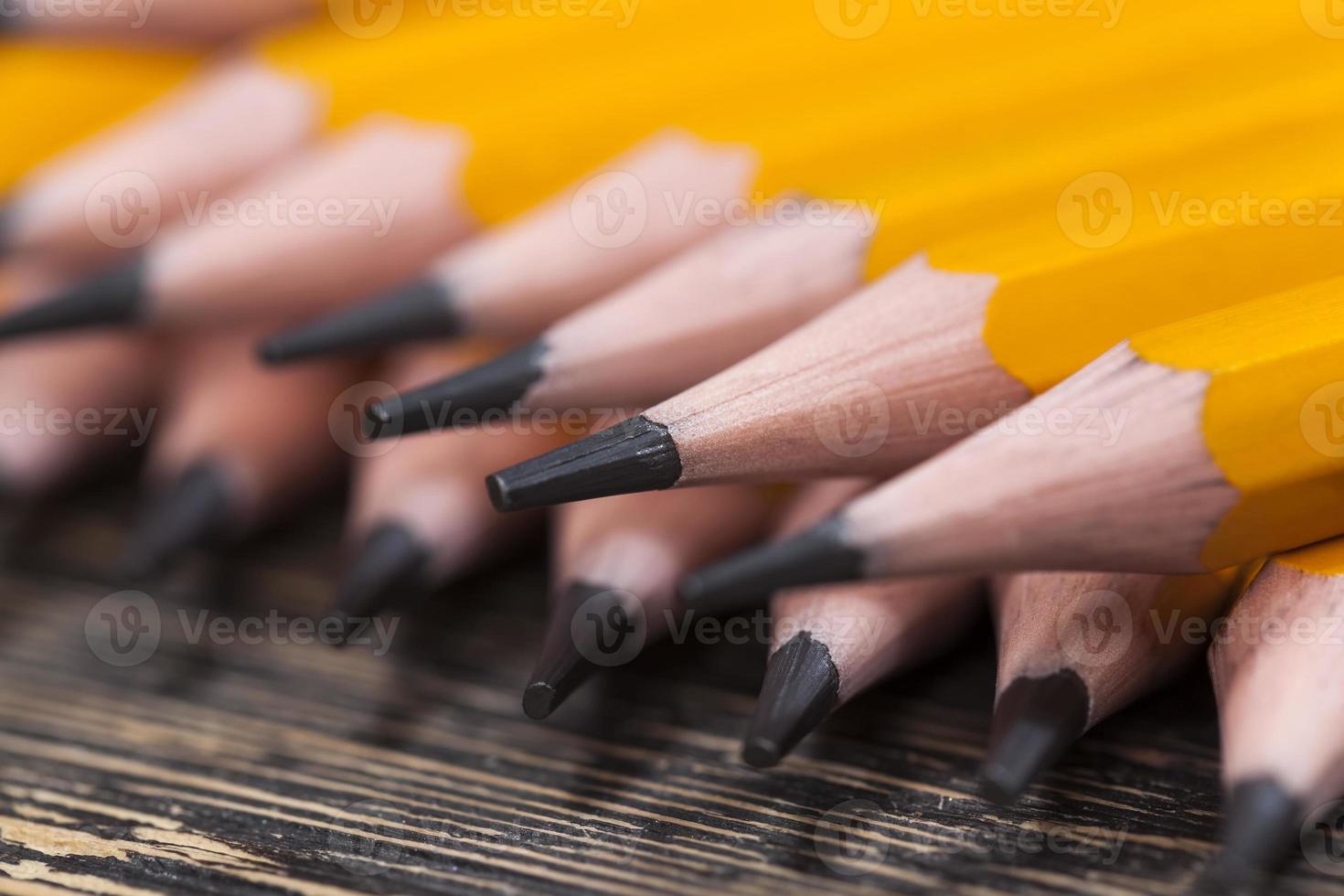 ordinary yellow wooden pencil photo