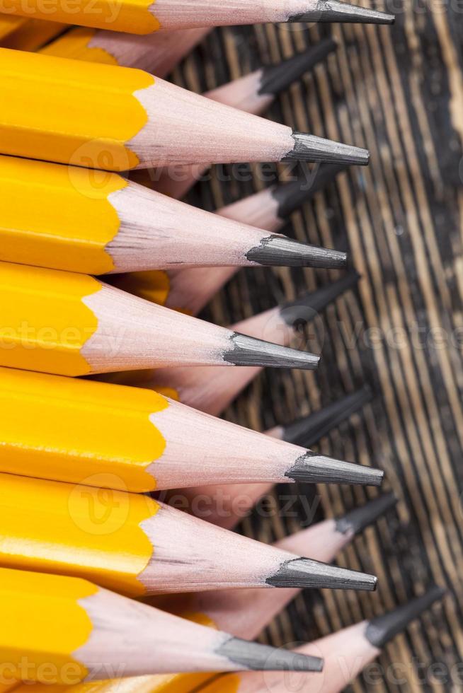 ordinary yellow wooden pencil photo