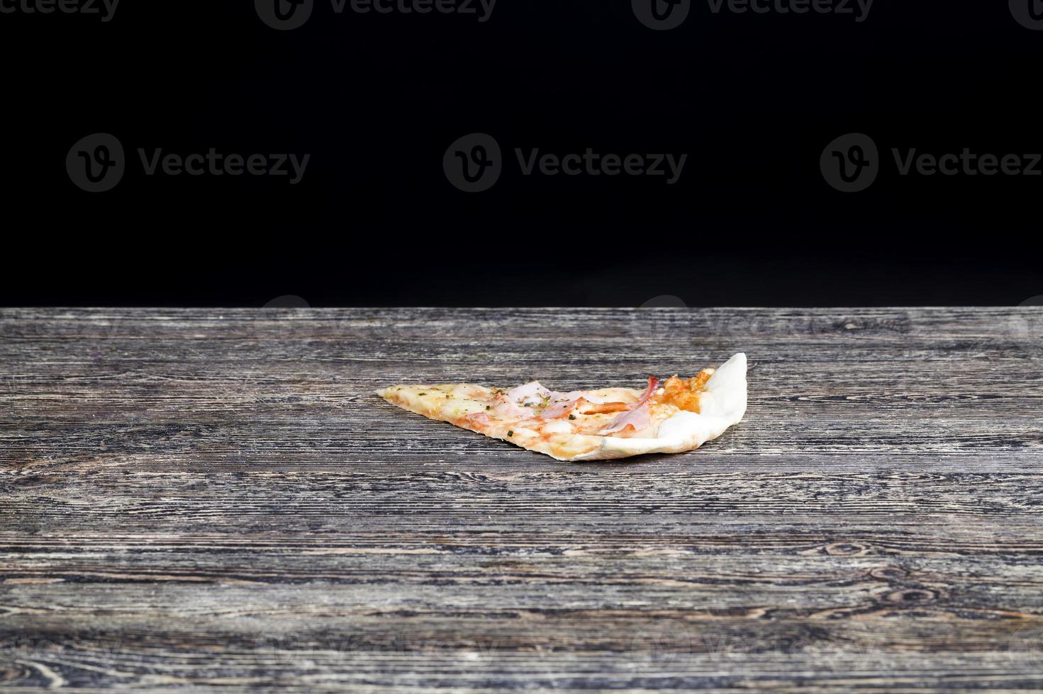 one pizza stuffed with ham photo