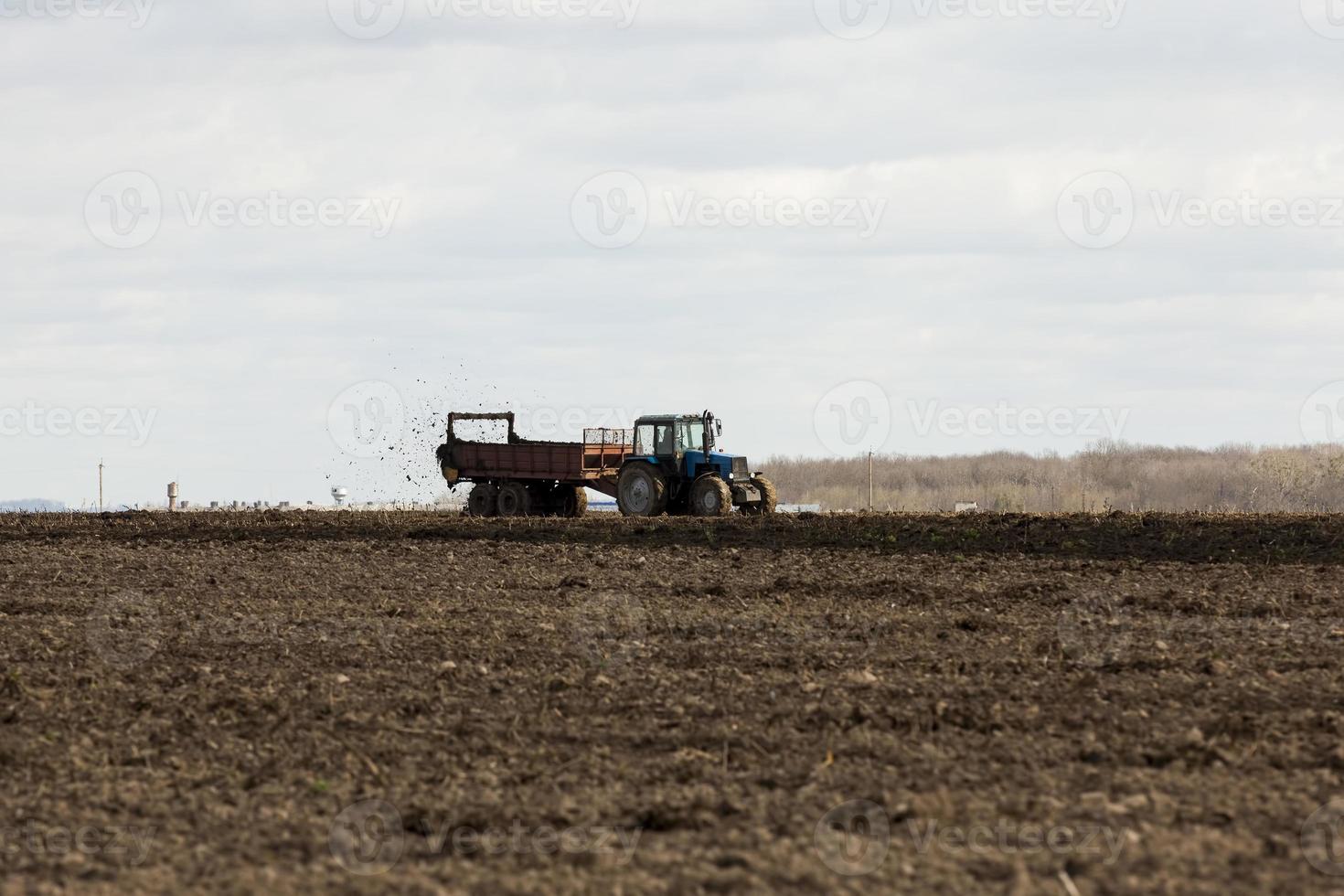 plowed agricultural field and fertile soil photo