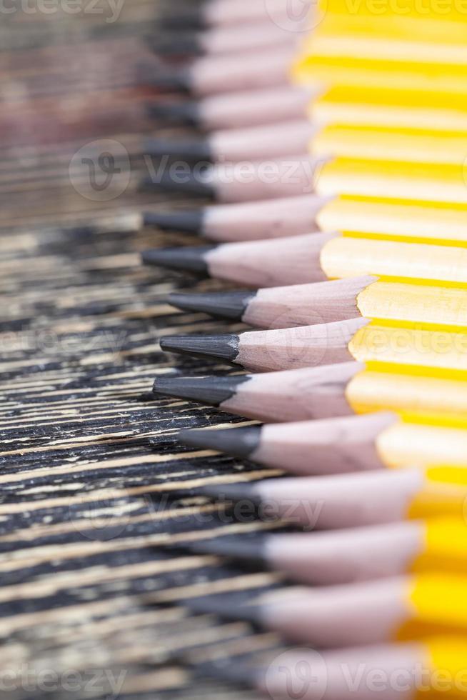 solid color wooden pencils with gray lead photo