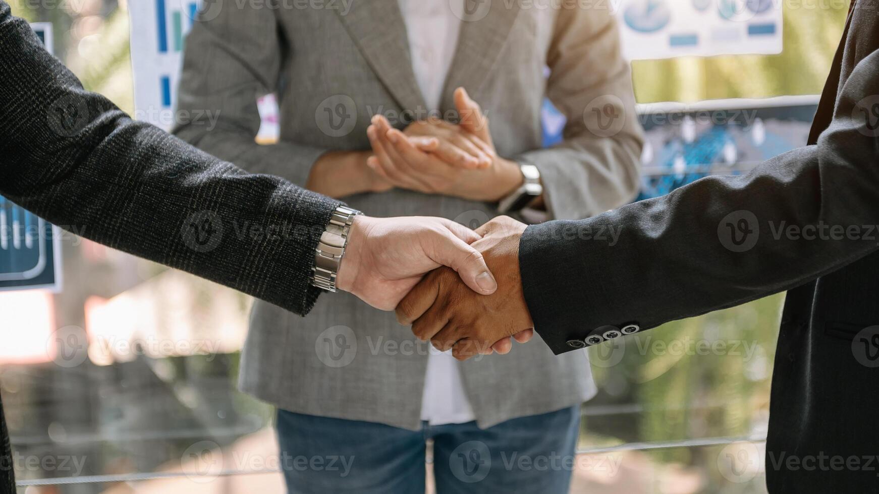 Close up on hands of business people join together their hands together on unity concept photo