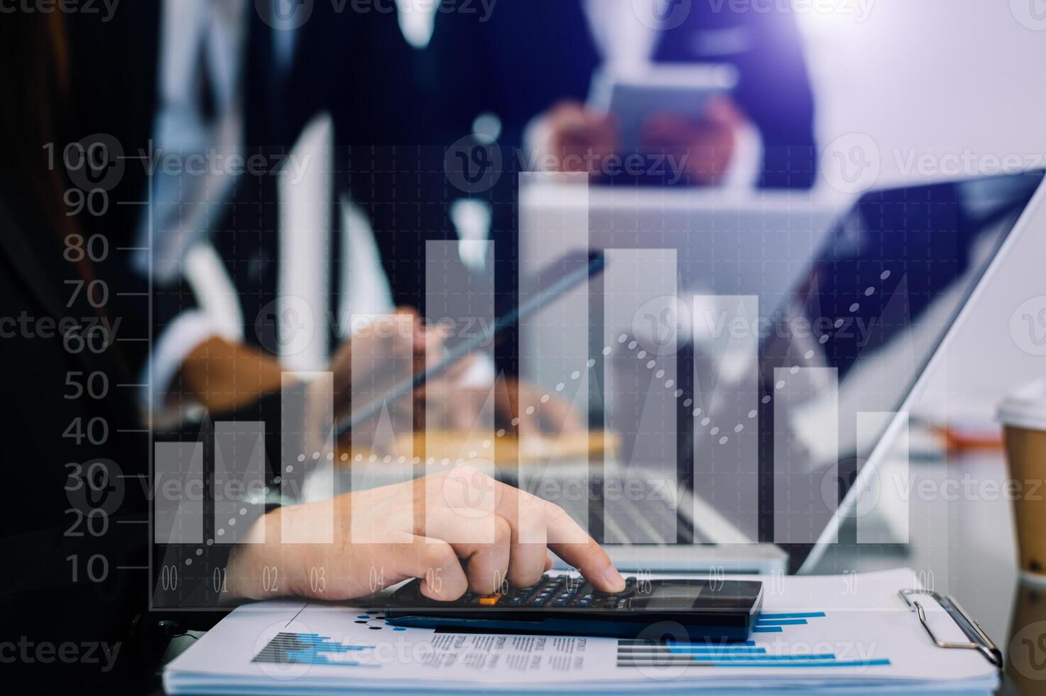 Businessman's hands with laptop and stock market graph background. Concept of research and trading. and financial dashboard with intelligence photo