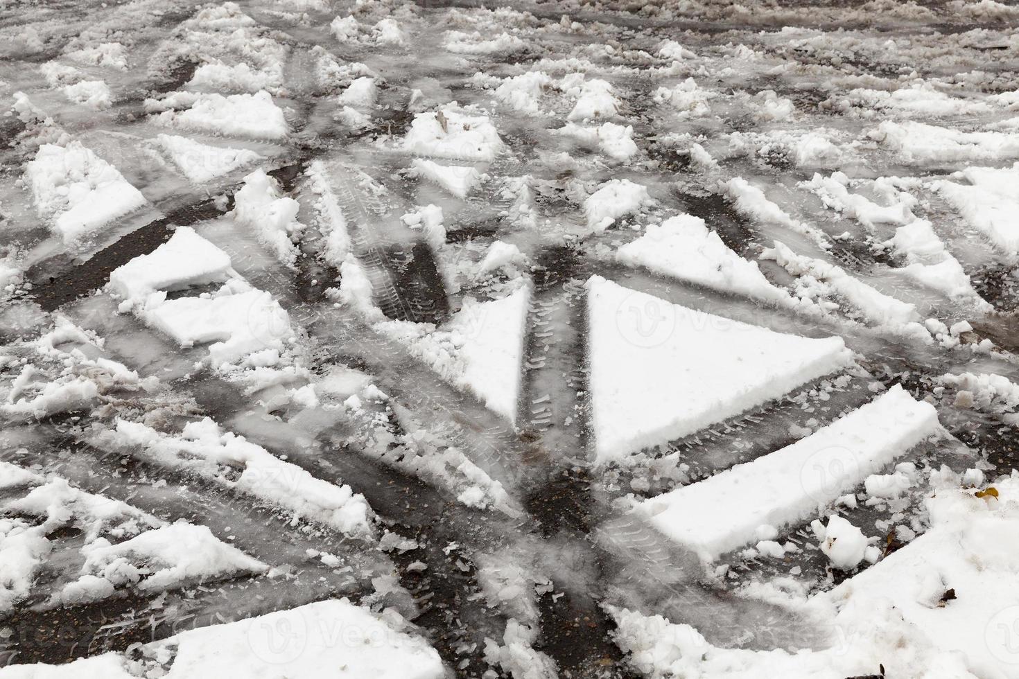 traces of the car on snow photo