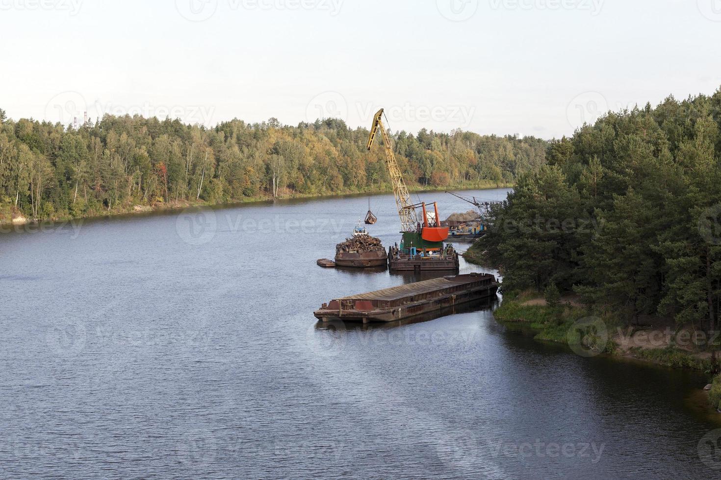 logging on a river photo