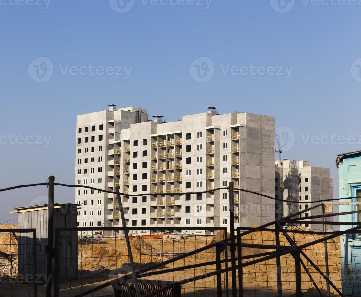 construction of apartment houses in the developing area photo