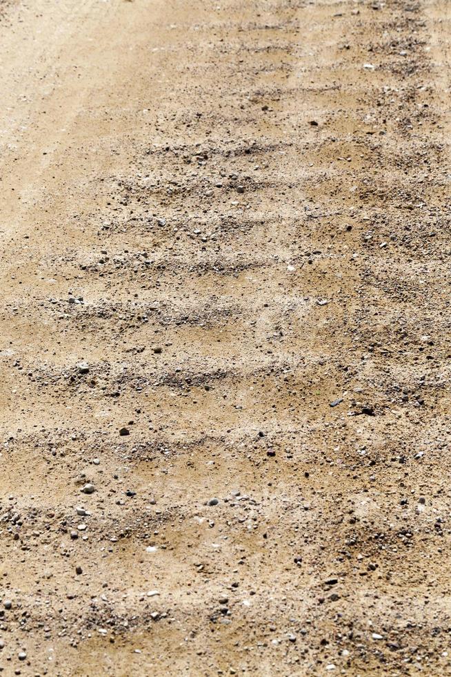 close up of a rural sand road photo