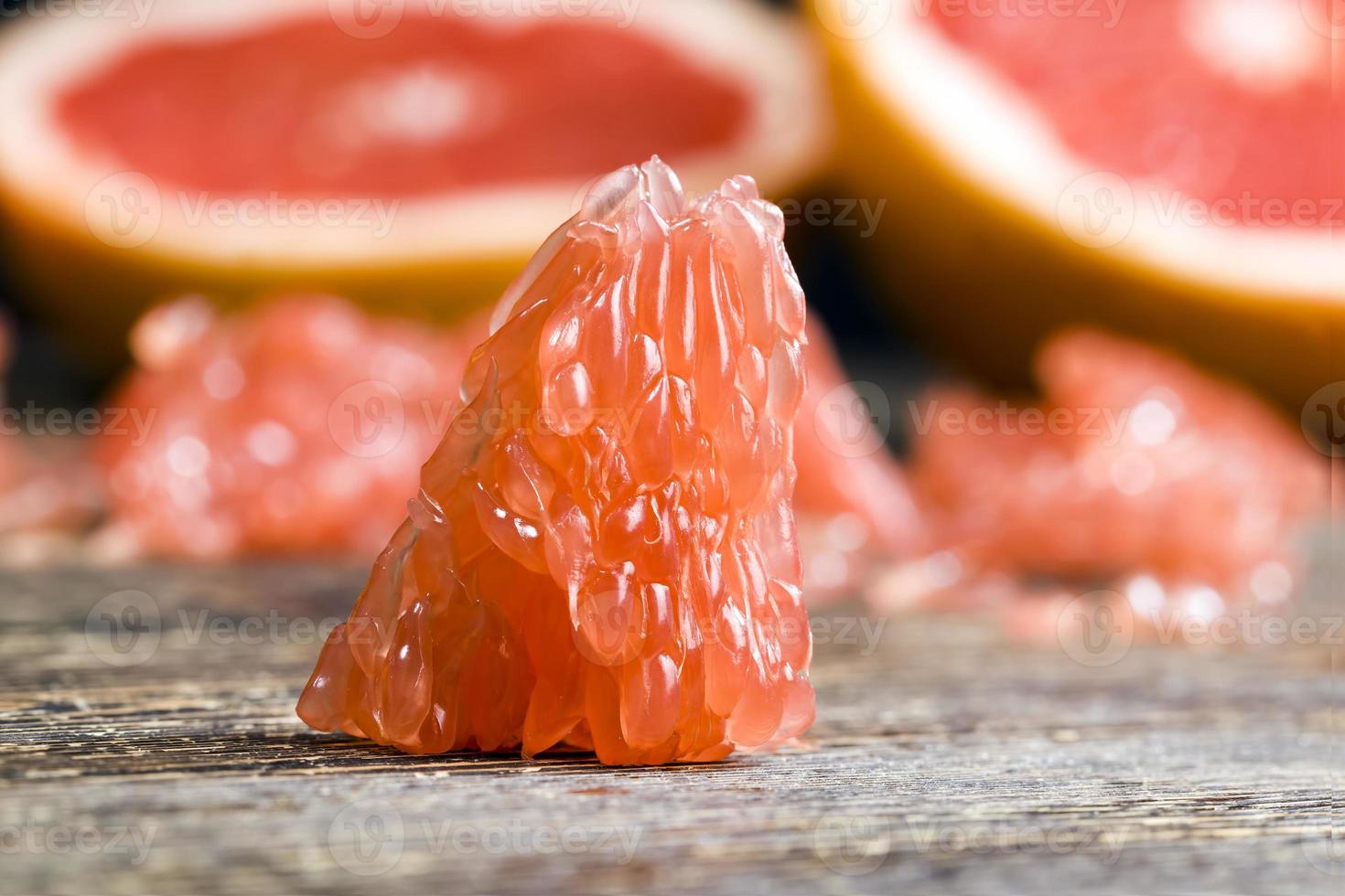 a piece of peeled grapefruit photo