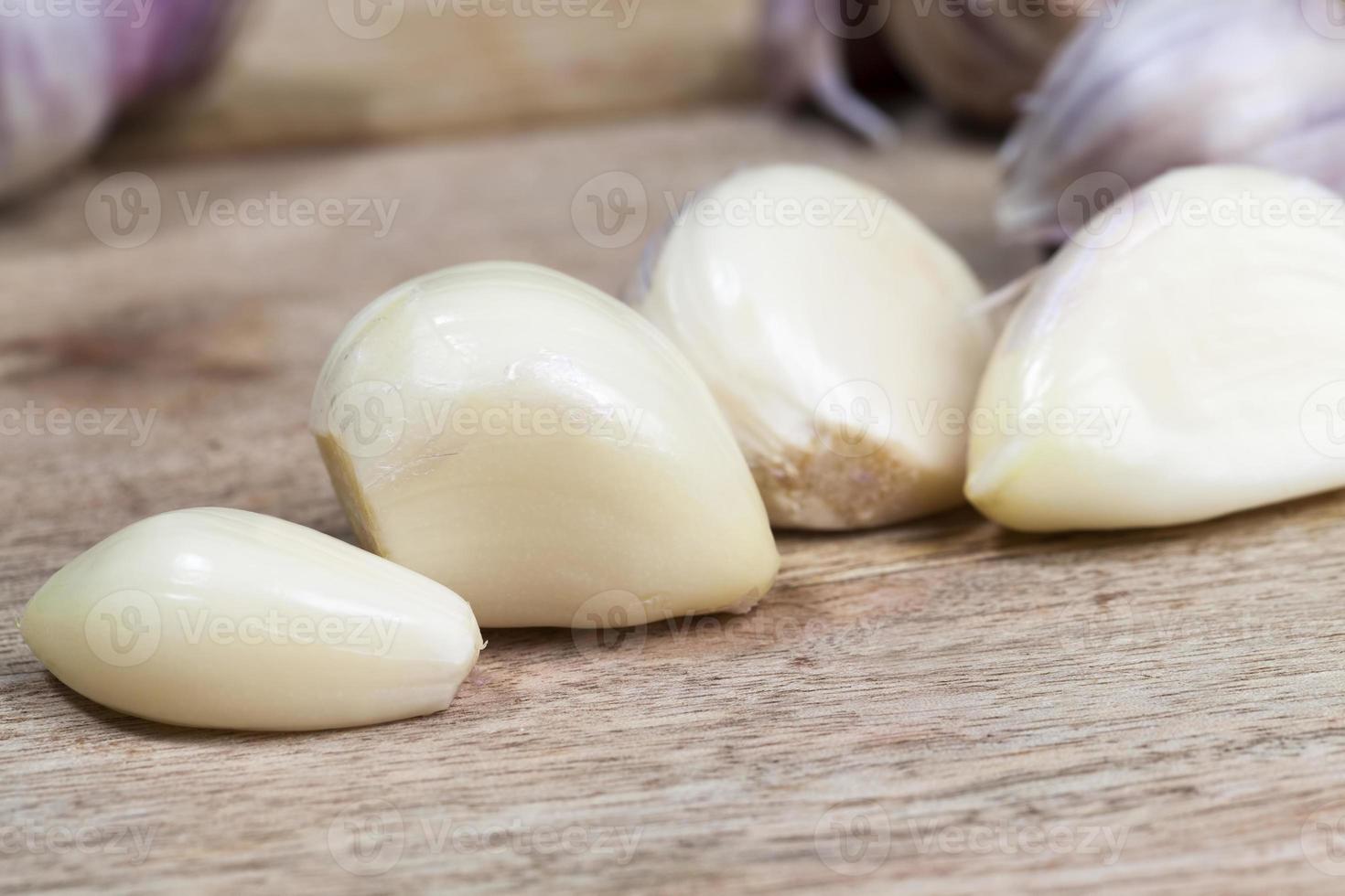 cloves and heads of ripe garlic photo