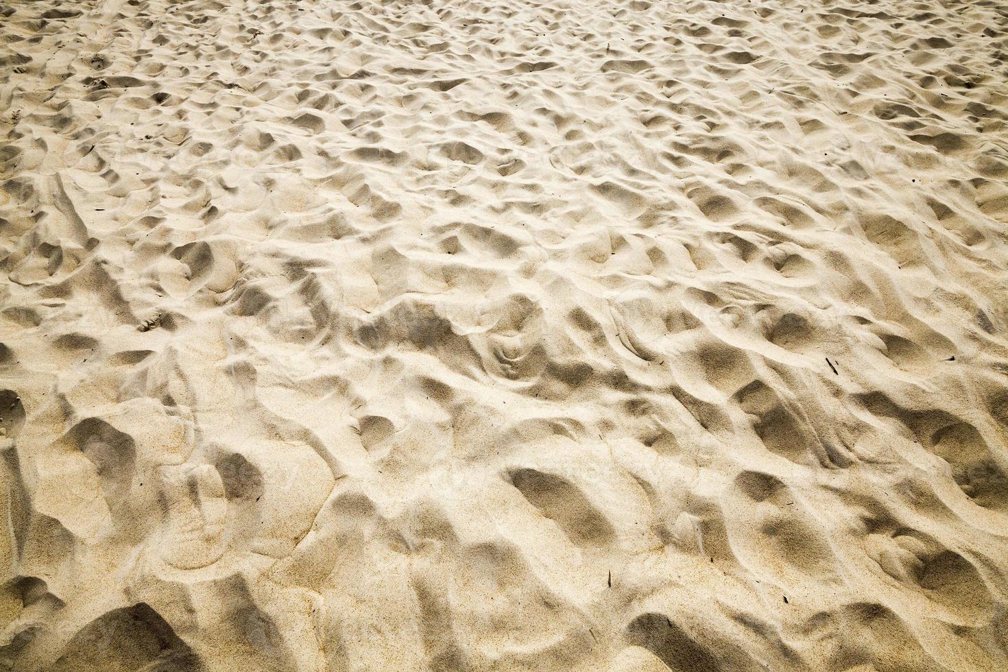 wavy uneven structure of sand photo
