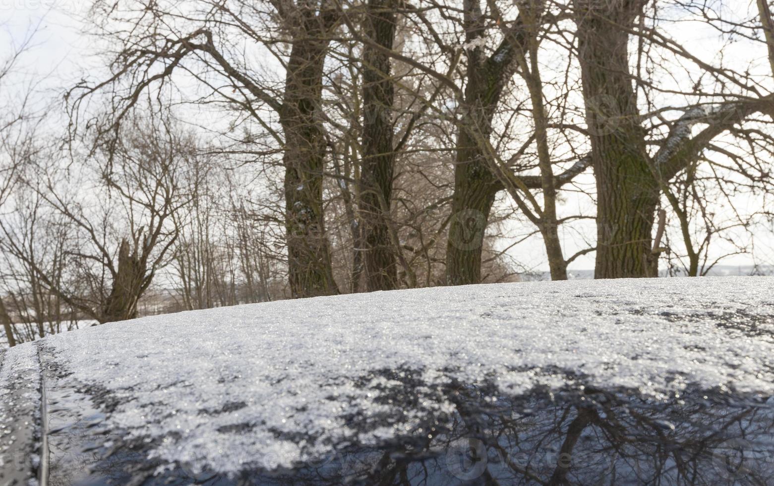 car covered with snow photo