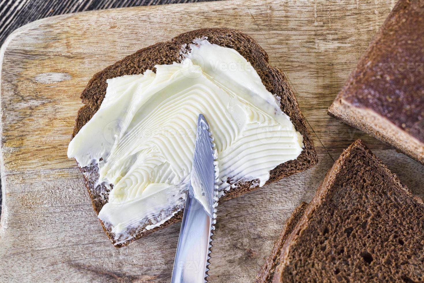 bread smeared butter photo