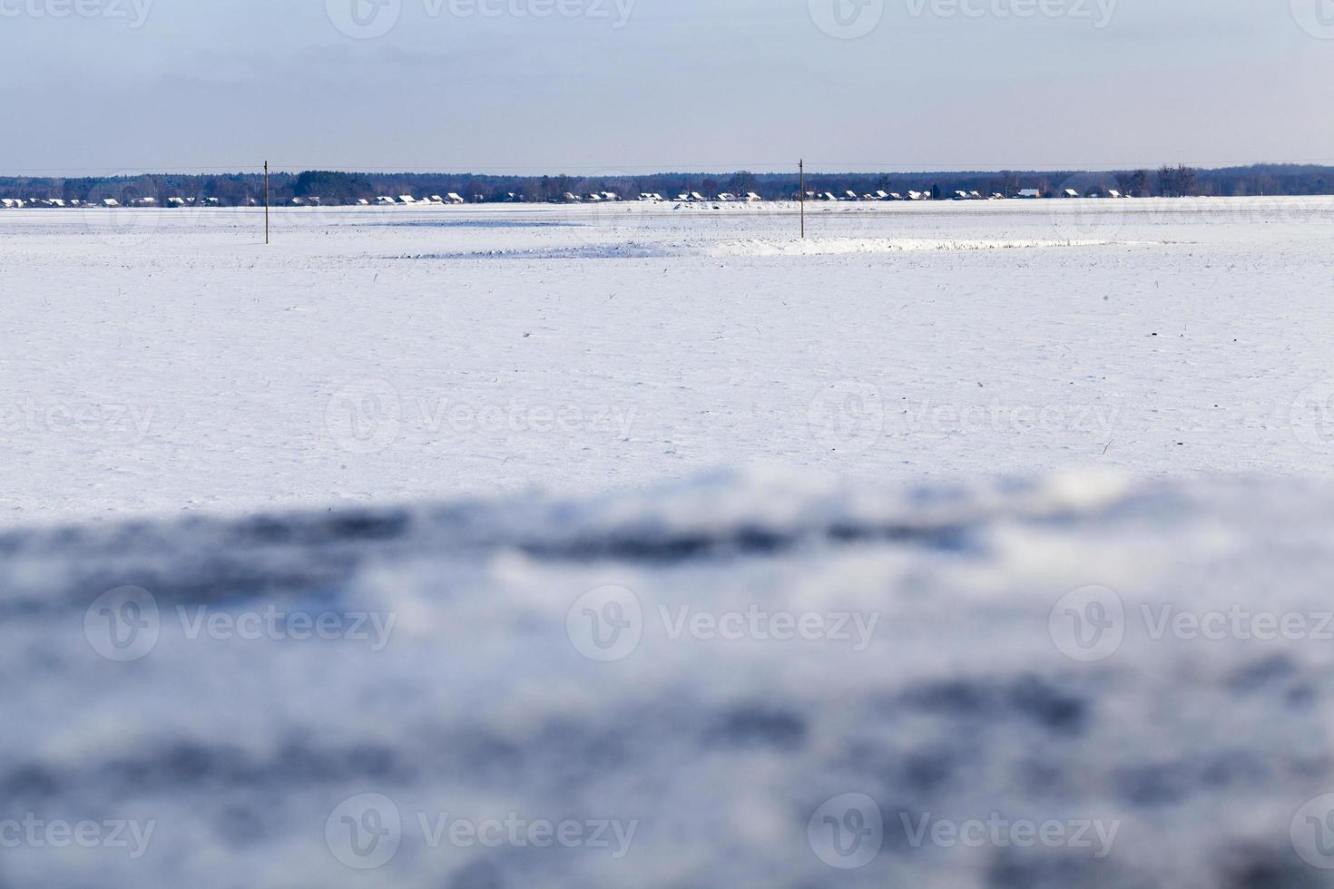 Winter landscape with a village photo