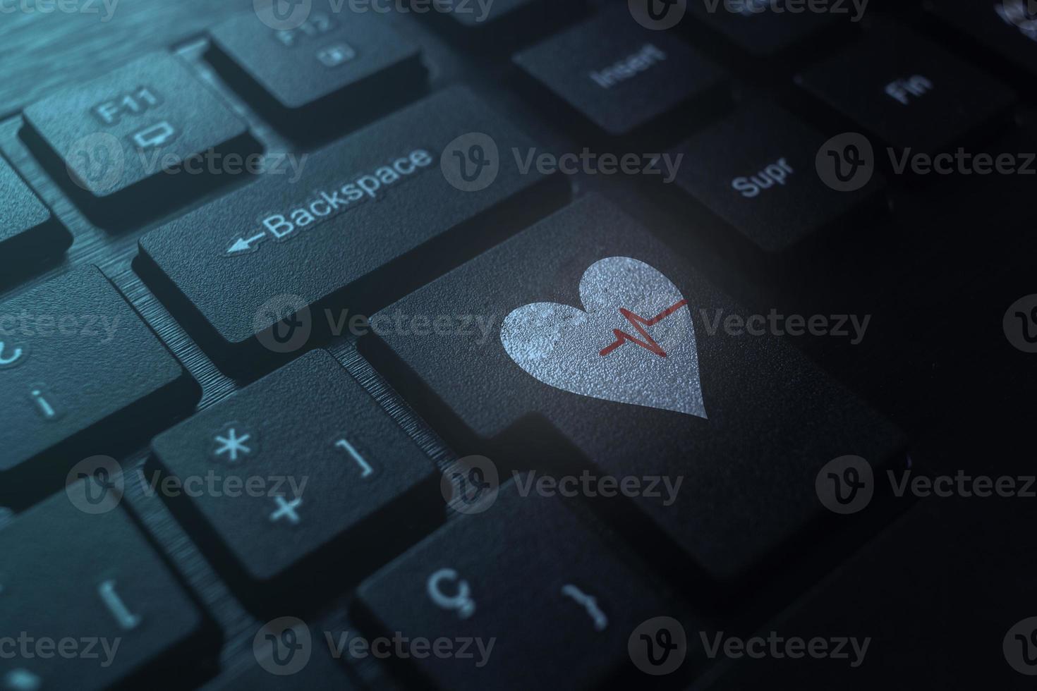 Medical healthcare concept of heart on keyboard with copy space. Digital healthcare and network connection. photo