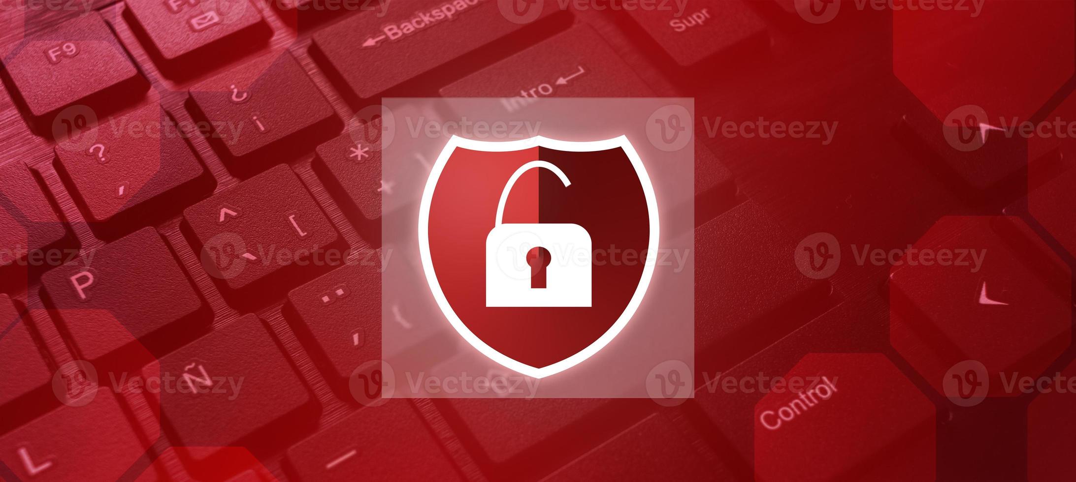 Keyboard background with red lights and security shield attacked. Internet of things. Cyber security concept. Protection and privacy. Business technology. photo