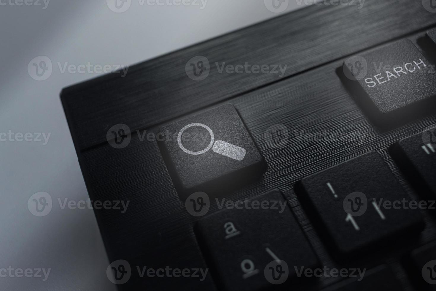 Keyboard with search button. Concept of searching browsing Internet data information. photo