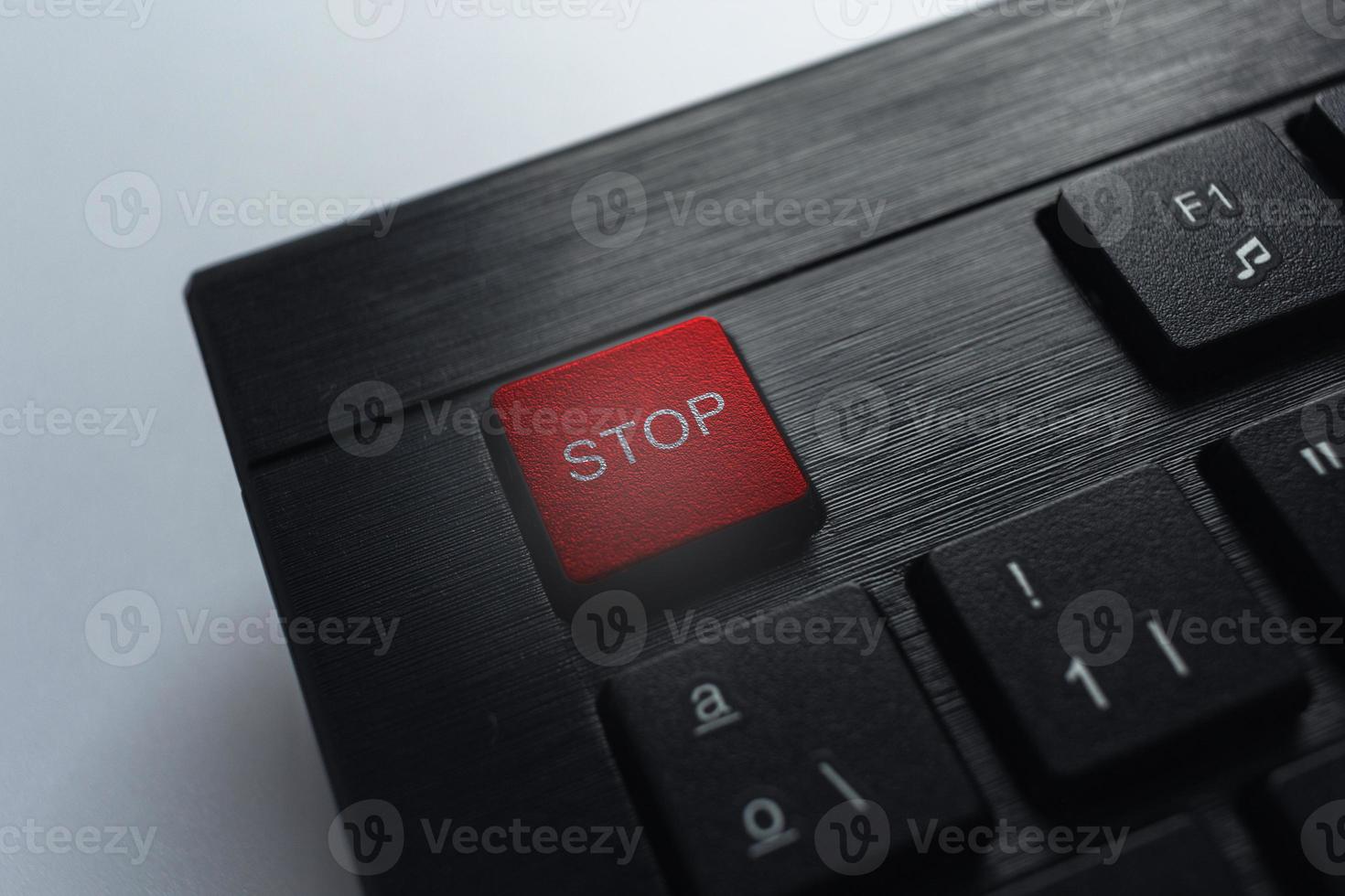 Security tech concept of red STOP signal on keyboard. Protection and privacy concept. Global technology. Data protection and cyber security. photo