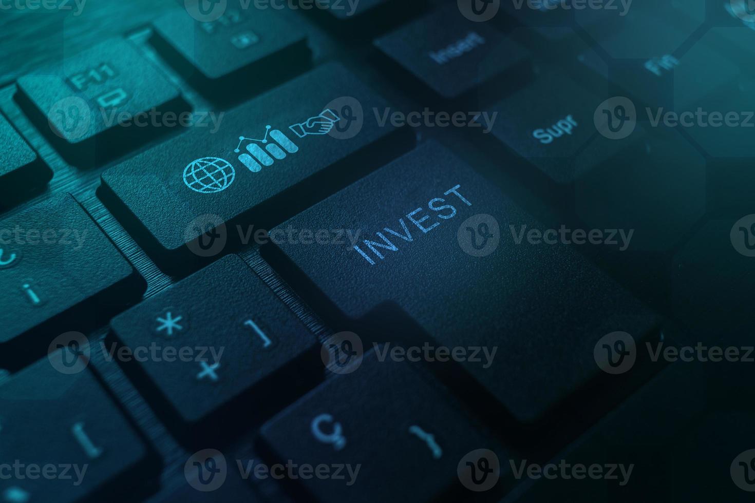 Keyboard with invest icons of growth, global and deal. investment and currency exchange concept. Press button for investing. photo