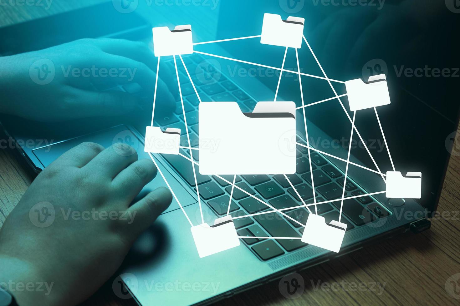 Woman hands typing on laptop with cold light and folders connecting interface. Manage Document System Storage concept. Database technology. File access. Online documentation software. photo