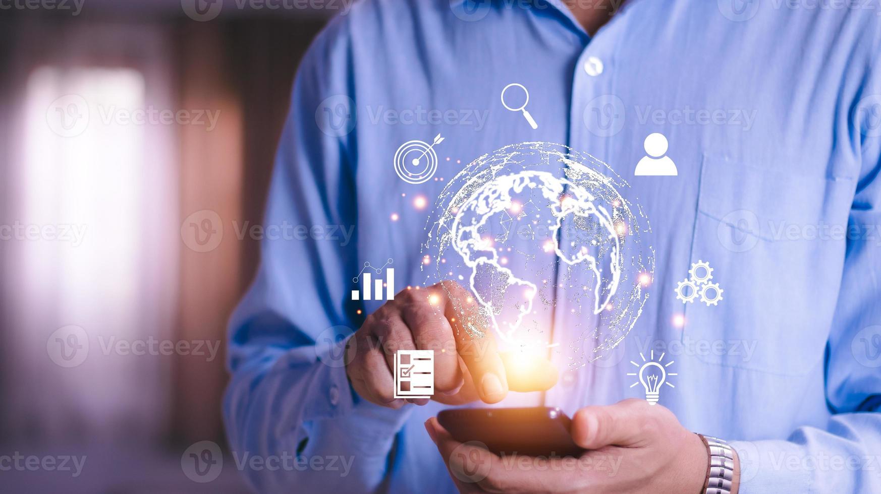 Man  holding virtual Global Internet connection metaverse. Business global internet connection application technology and digital marketing, Financial and banking, Digital link tech, big data. photo