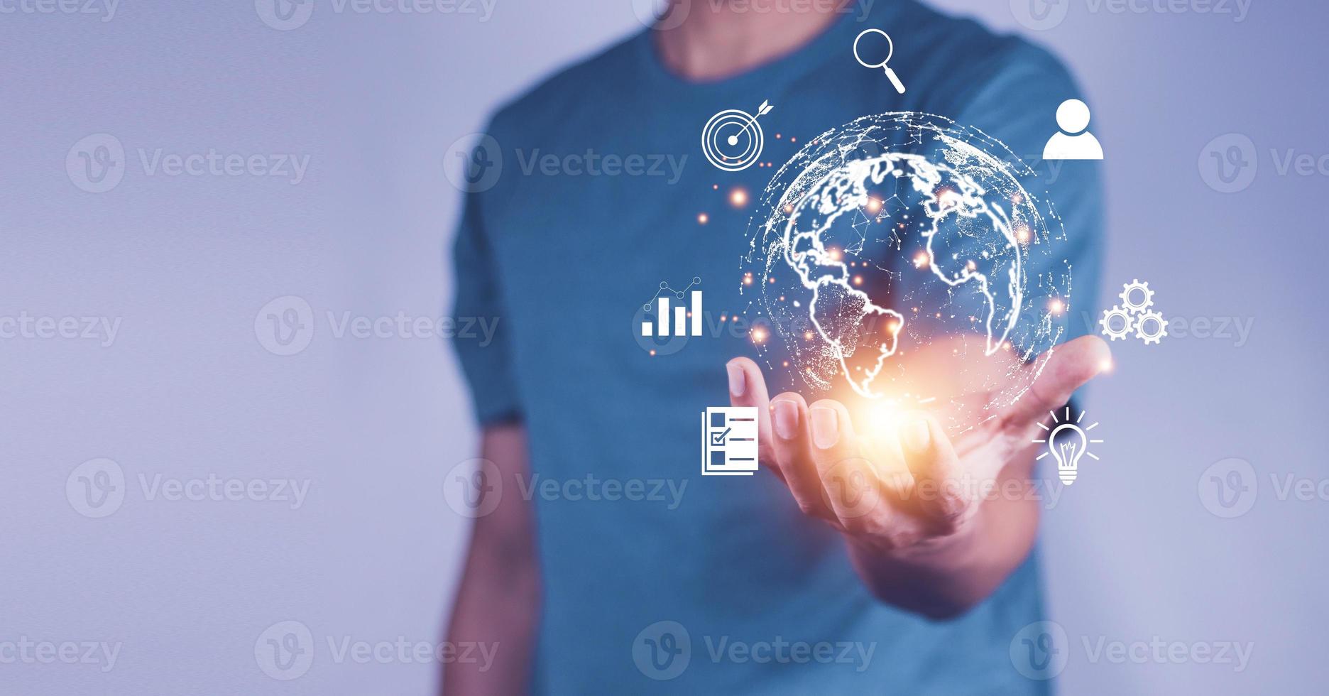 Man  holding virtual Global Internet connection metaverse. Business global internet connection application technology and digital marketing, Financial and banking, Digital link tech, big data. photo