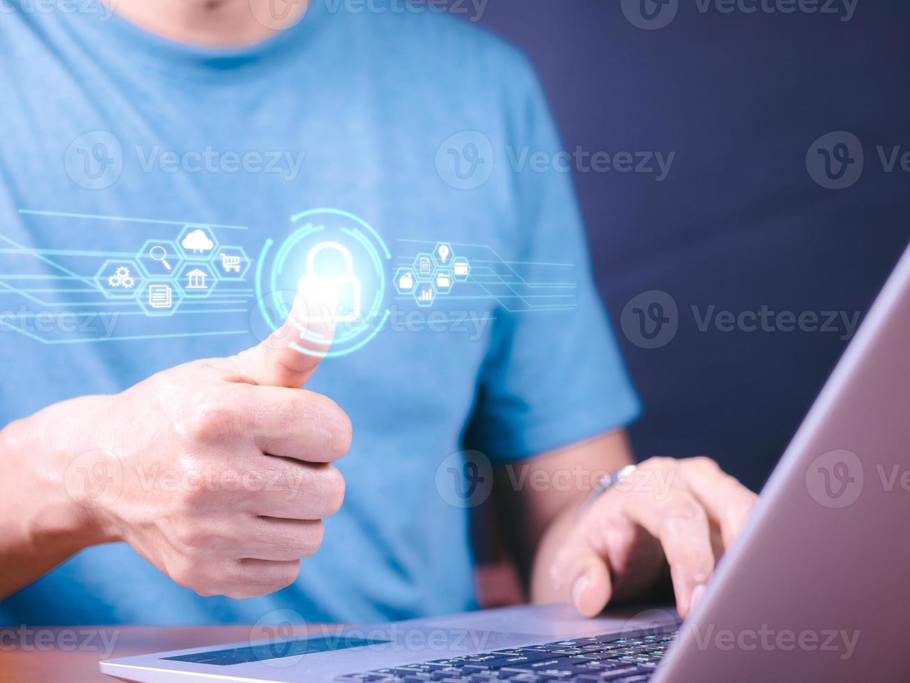 Cybersecurity and privacy concepts to protect data. Lock icon and internet network security technology. Businessman protecting personal data on smart phone with virtual screen interfaces. photo