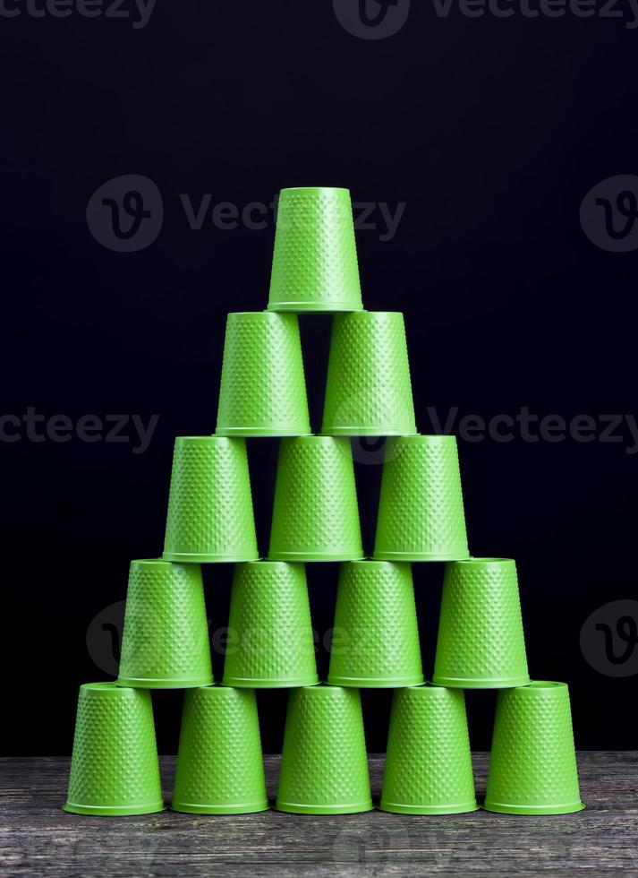 a lot of green plastic drinks cups photo