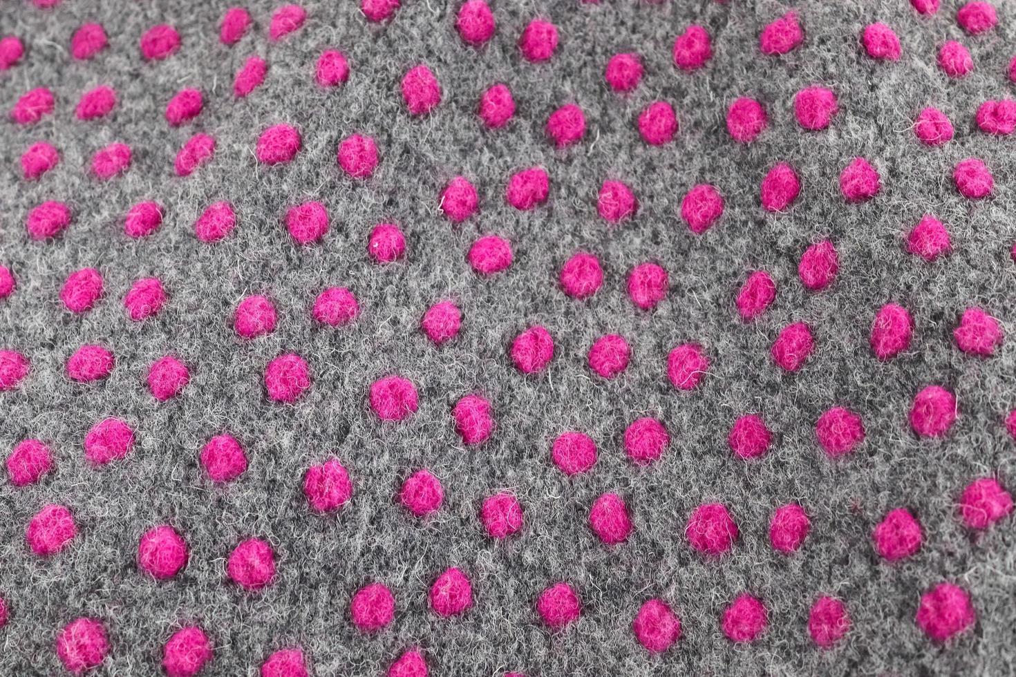 Detailed close up view on samples of cloth and fabrics in different colors found at a fabrics market photo
