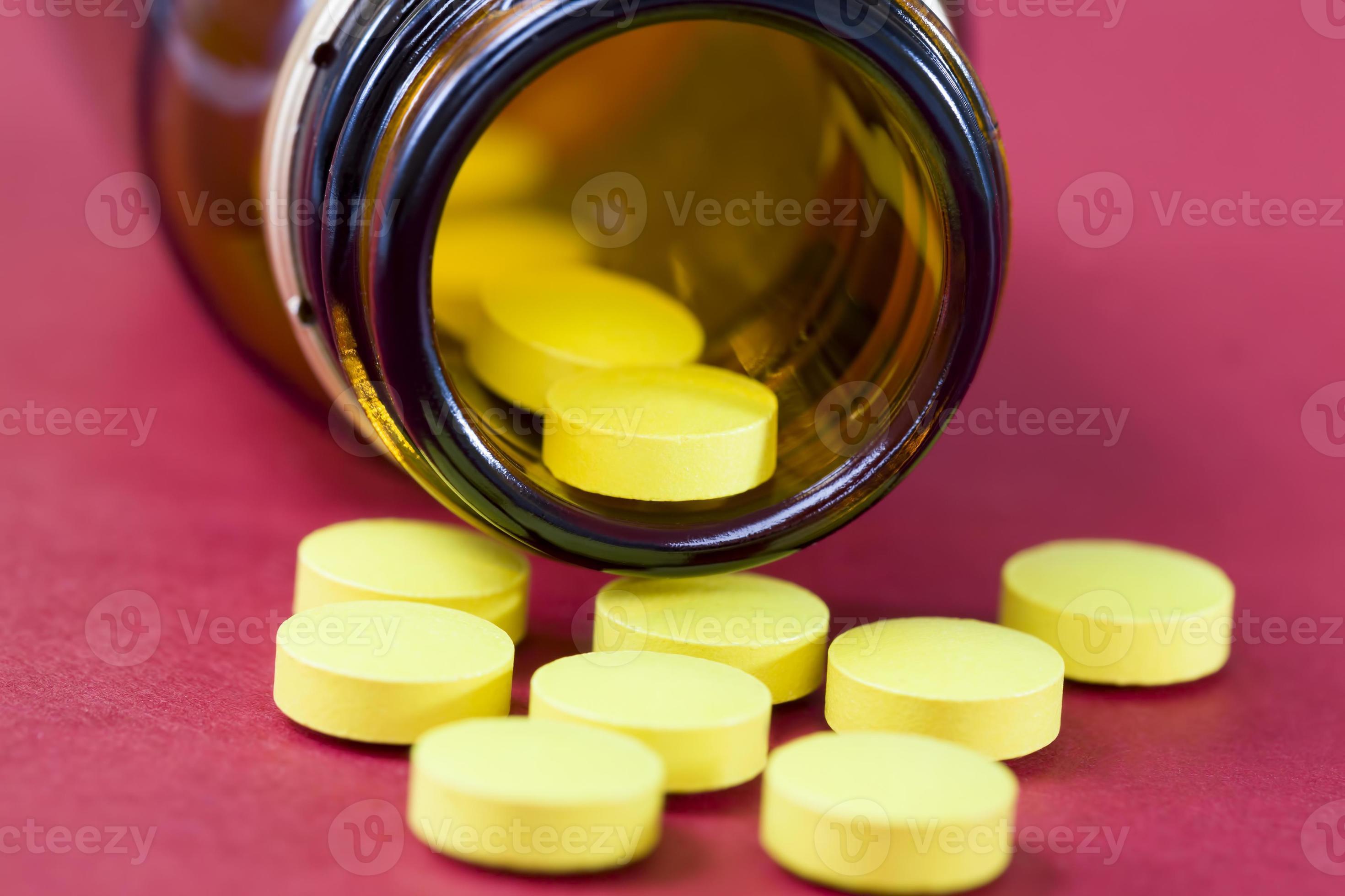 a-large-number-of-yellow-tablets-9427465-stock-photo-at-vecteezy