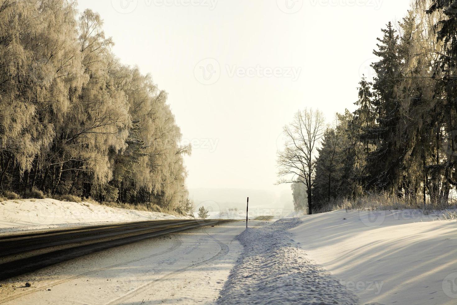wide paved winter road photo