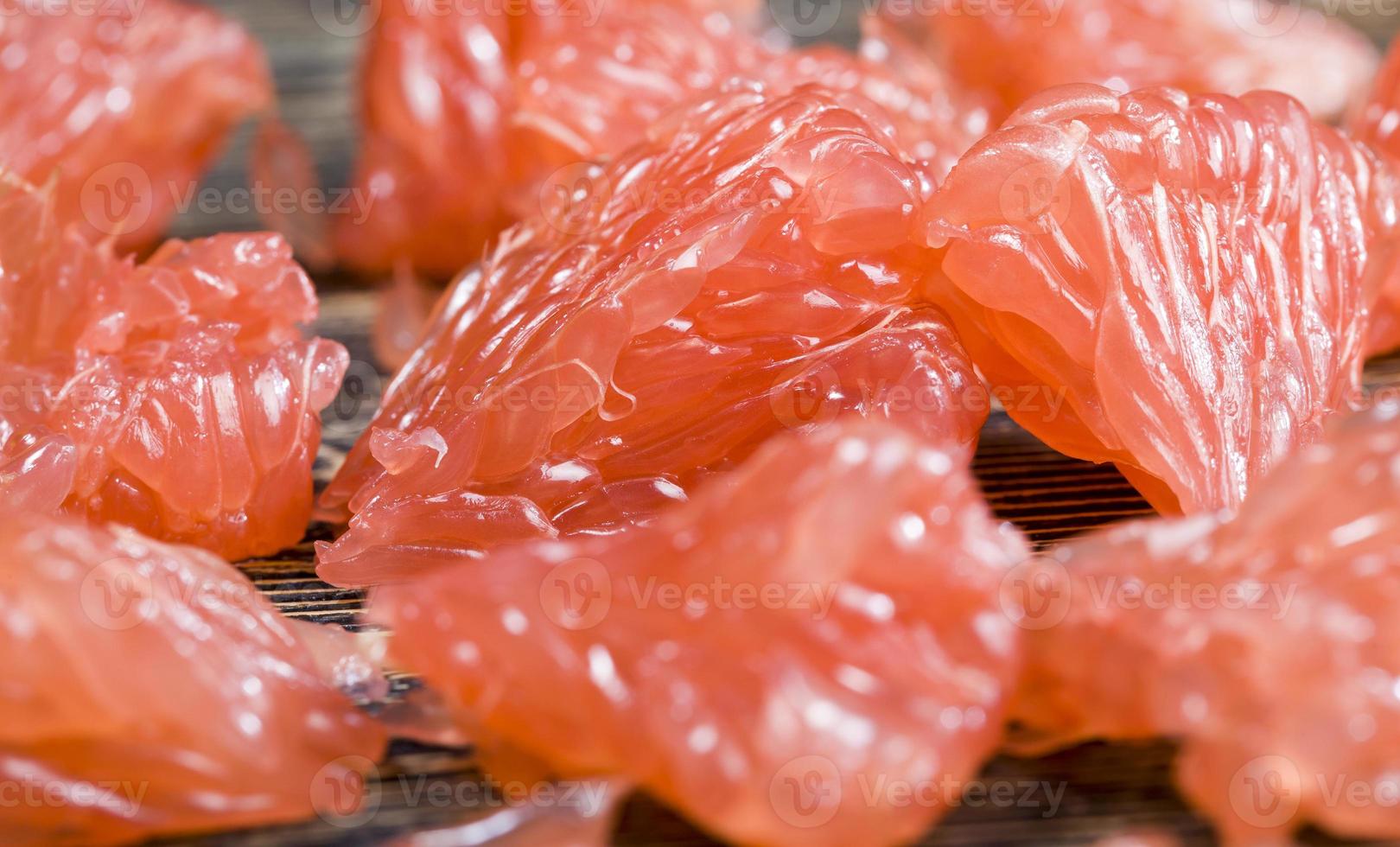 a piece of peeled grapefruit photo