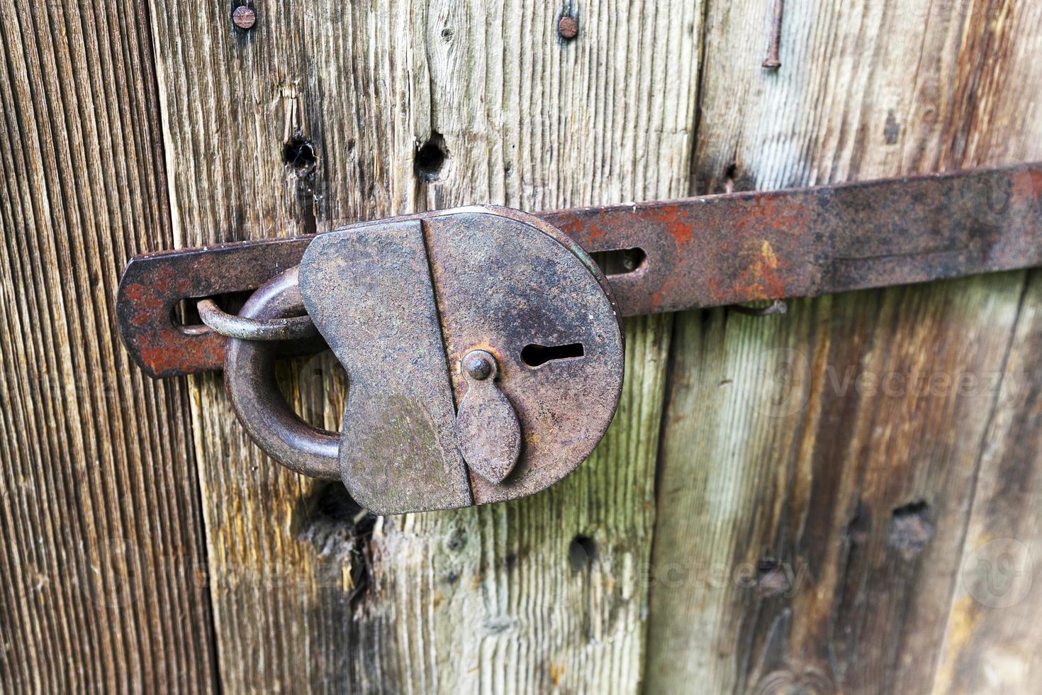 padlock .  wooden door photo