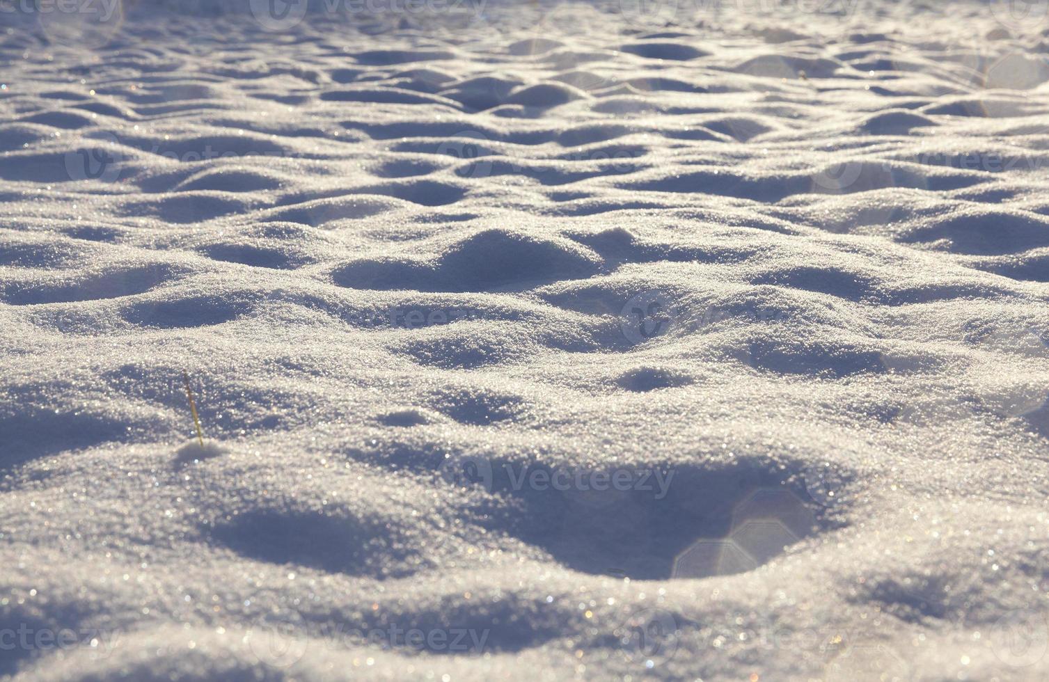 Snow drifts on the street photo