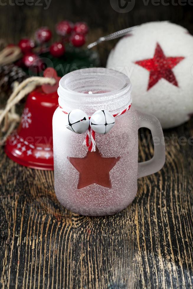 christmas candle in a glass jar and other decorations 9439395 Stock Photo at Vecteezy