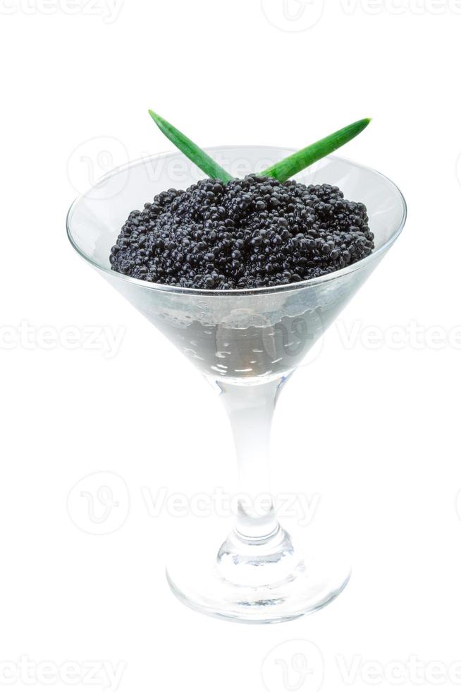 Black caviar on white background photo