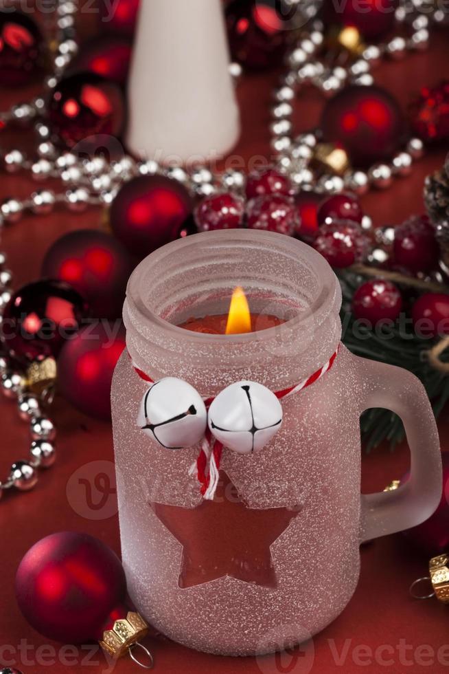 christmas candle in a glass jar and other decorations 9440185 Stock Photo at Vecteezy