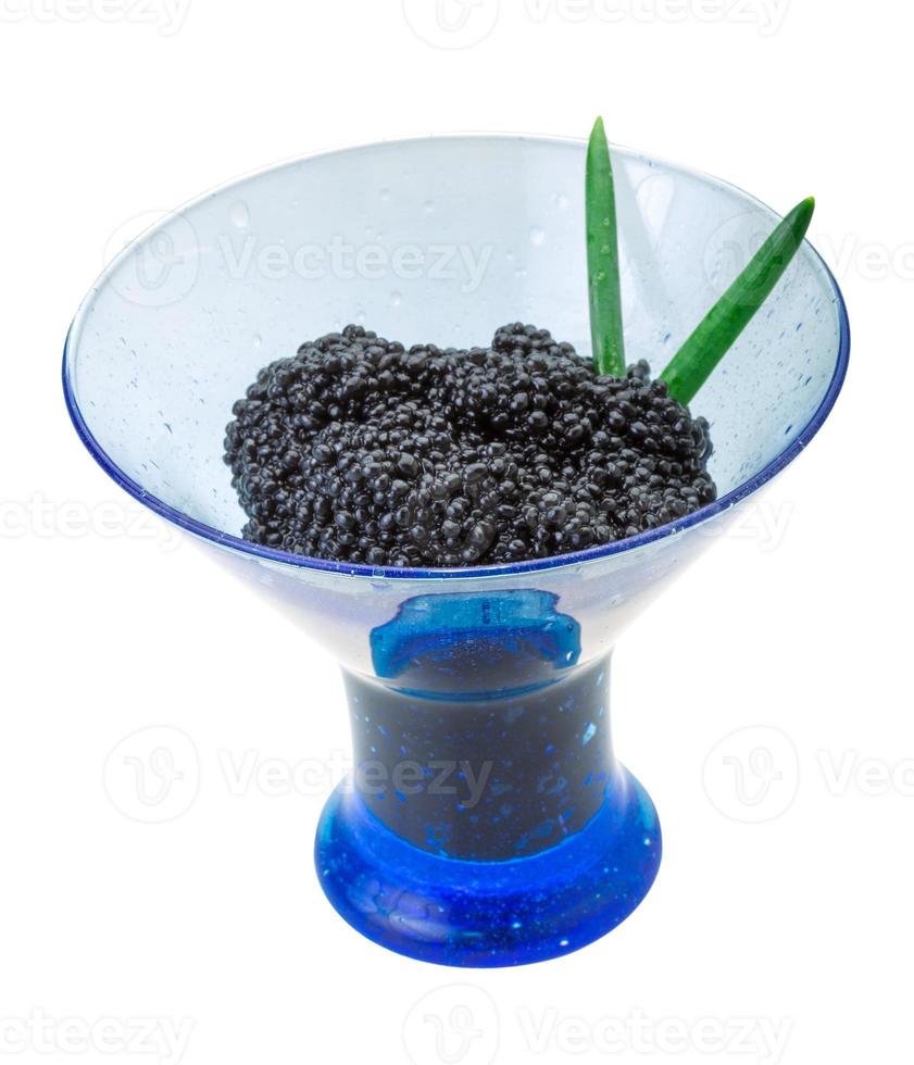 Black caviar on white background photo